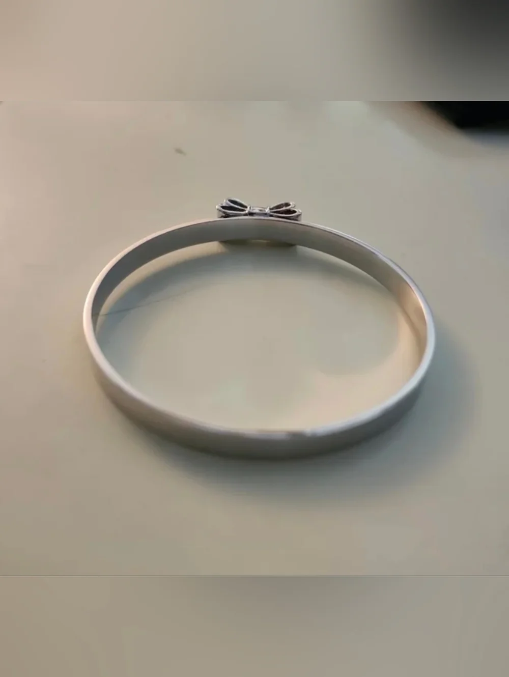 Kate Spade New York 'Take a Bow' Silver Tone Bangle Bracelet 2.5" - Picture 8 of 8